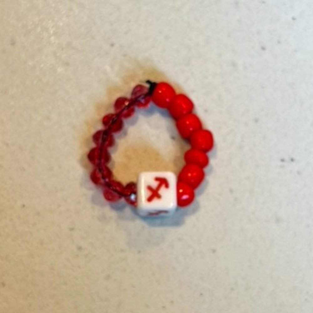 "SAGITTARIUS" HOROSCOPE RED BEADED RING (ONE SIZE)